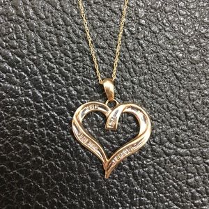 Gold and diamond heart necklace